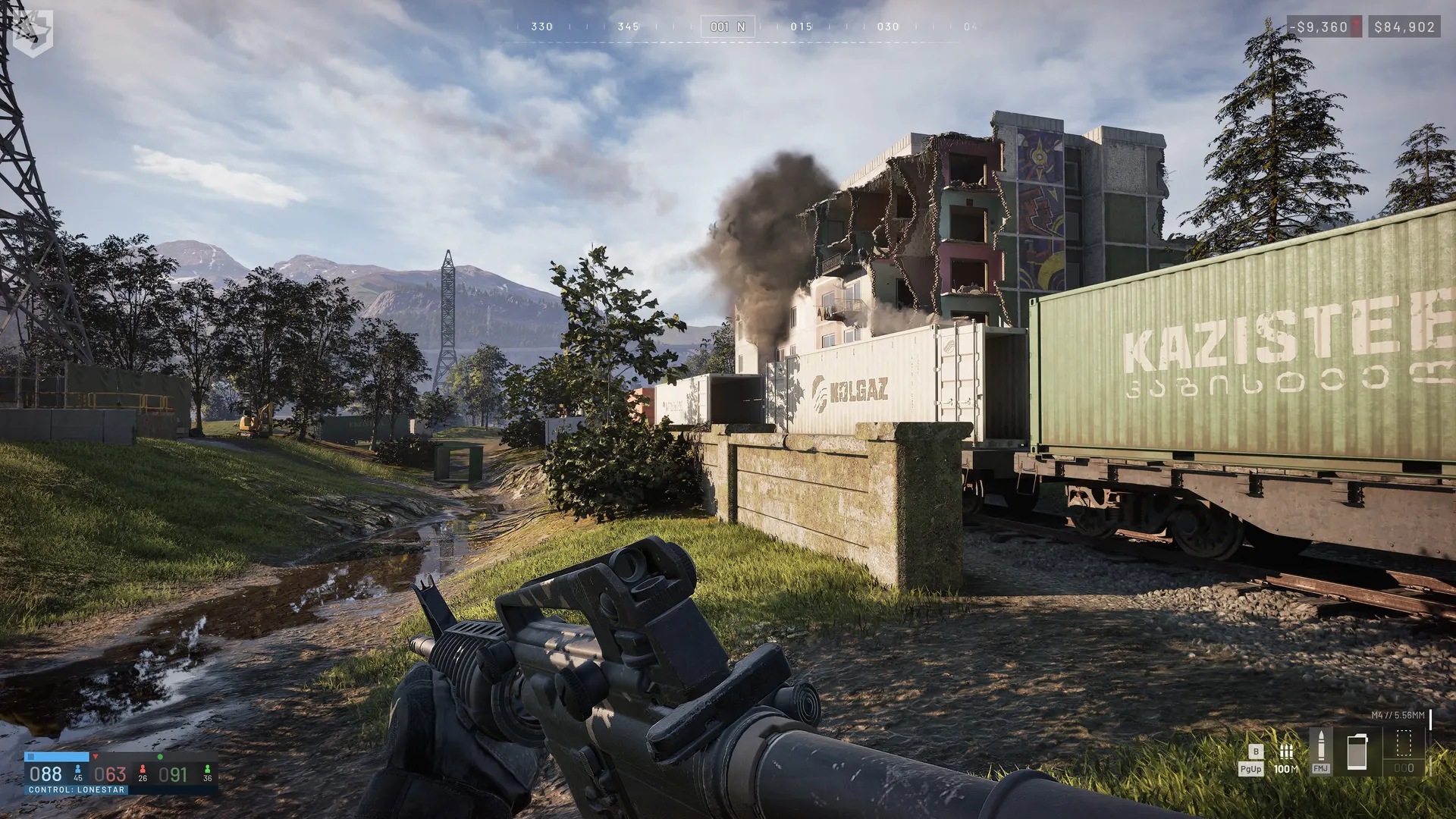 A WARDOGS firefight beside a damaged industrial rail yard