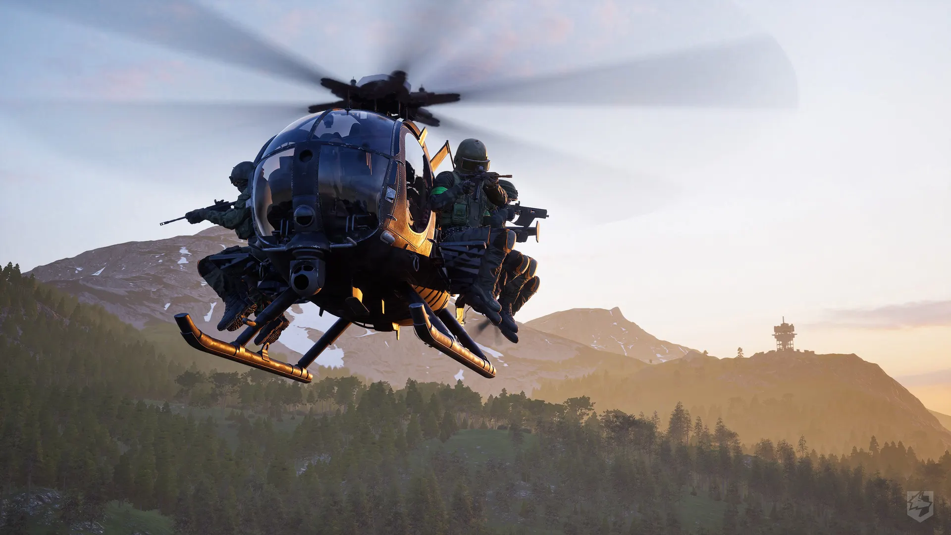 A Little Bird helicopter carrying operators over a WARDOGS valley