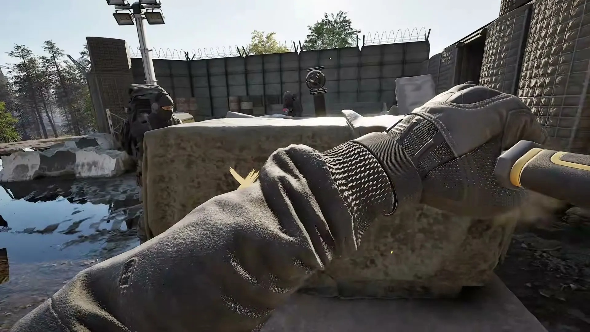 A WARDOGS player using a construction tool behind cover