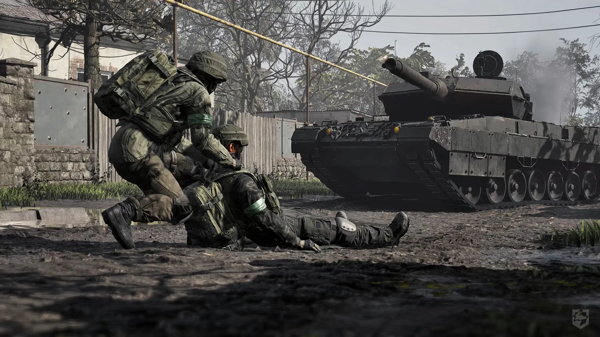 A WARDOGS medic treating a teammate beside an armored tank