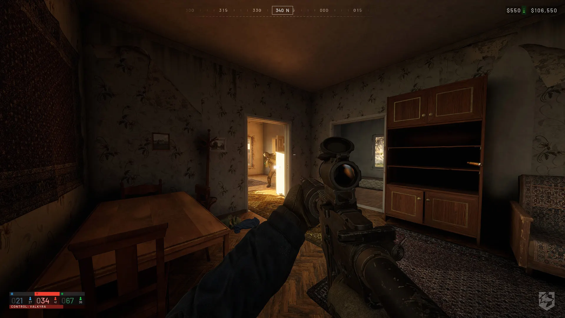 A WARDOGS operator aiming through a shadowed house interior