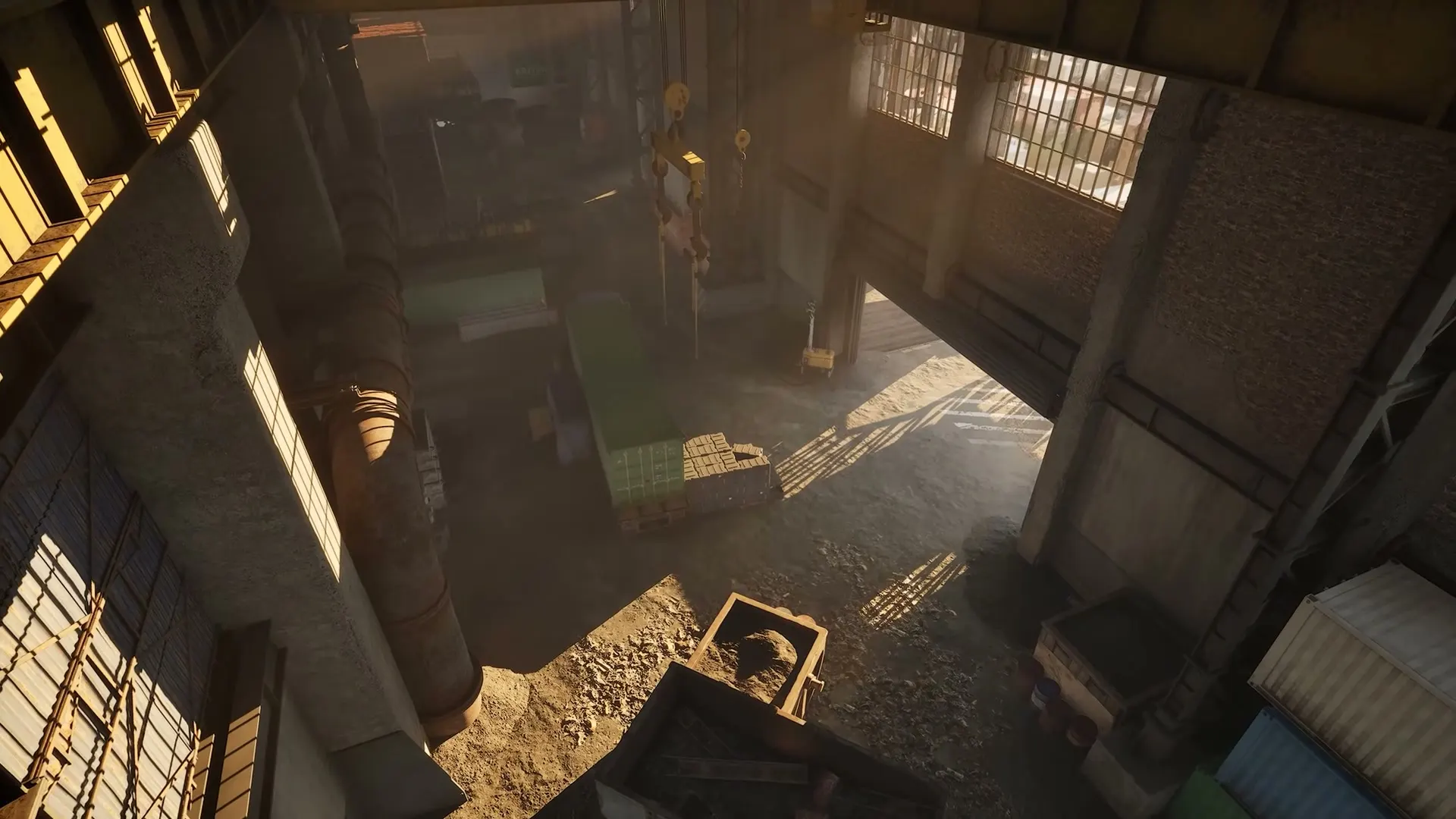 A WARDOGS operator descending into a sunlit factory interior